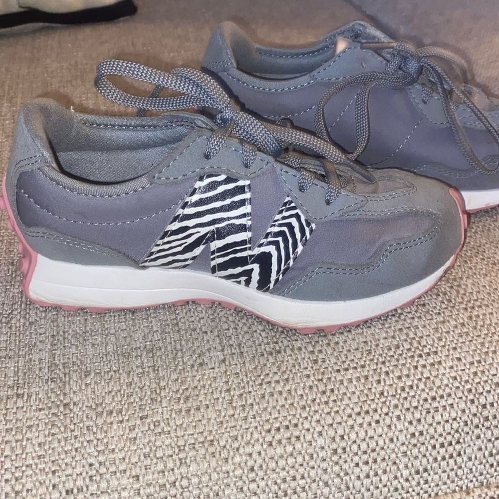 Little girls adorable New Balance sneakers